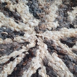 Round wool floor rug