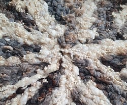 Round wool floor rug