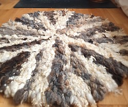 Round wool floor rug