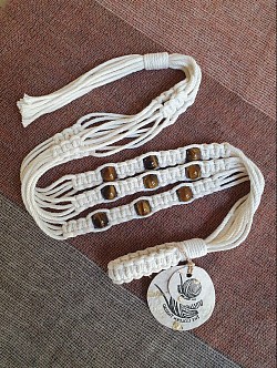 Plant hanger with tigers eye beads