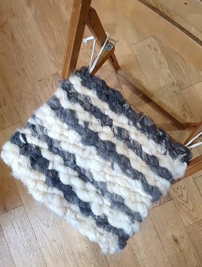 White and grey Romney seat pad